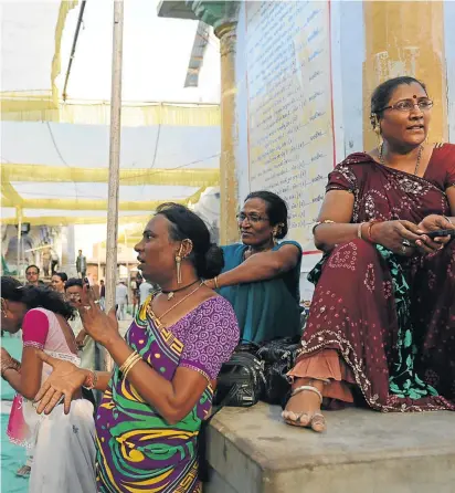  ?? Picture: AFP PHOTO/SAM PANTHAKY ?? RECOGNISED: Indian transgende­r people gather to worship Goddess Becharaji on the campus of Becharaji Temple some 110km from Ahmedabad this week