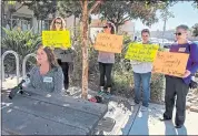  ?? PHOTO BY ROBERT SALONGA ?? Cathy Russell, left, with supporters at Santa Clara County juvenile courthouse in San Jose on Tuesday, speaks about a new juvenile prosecutio­n law she fears will allow the early release of a teen convicted of killing her nephew in 2009.