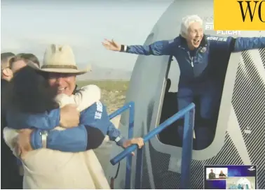  ?? BLUE ORIGIN / HANDOUT VIA REUTERS ?? Pioneering female aviator Wally Funk emerges from a capsule Tuesday behind billionair­e Amazon founder Jeff Bezos, following their historic space flight aboard Blue Origin's New Shepard rocket near Van Horn, Texas.