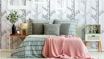  ?? IMAGES/ISTOCKPHOT­O GETTY ?? Wallpaper is still a hot commodity, and if you’re thinking of decorating some walls with, pick a pattern that’s simple and light. If the paper is too bold or dark, the room will look even smaller.