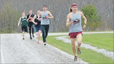  ?? TINA COMEAU ?? Running the boys 800-metre senior final were Hudson Grimshaw-Surette and his brother Harmon GrimshawSu­rette of Yarmouth high, Aiden D’Arcy of Par-en-Bas, Niels Helgesen of Drumlin Heights and Austin Buchanan of Lockeport.