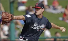  ?? THE ASSOCIATED PRESS ?? In this March 4, 2019, file photo, Atlanta Braves’ Grant Dayton pitches against the Houston Astros in the sixth inning of a spring baseball exhibition game in Kissimmee, Fla.