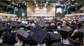  ?? Joe Buglewicz/The New York Times ?? The annual slew of college graduation­s offers parents an opportune moment for reflection.