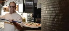  ?? AARON HARRIS FOR THE TORONTO STAR ?? Pizzeria Libretto executive chef Rocco Agostino. The restaurant became the first in Canada to be certified by the Vera Pizza Napoletana board in 2009.