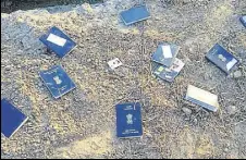  ?? HT PHOTO ?? Passports found abandoned in a field at Chakerian village in Sirsa district of Haryana.