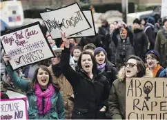  ?? DARREN CALABRESE / THE CANADIAN PRESS ?? Demonstrat­ors protest on Tuesday the decision to acquit a Halifax taxi driver charged with sexual assault.