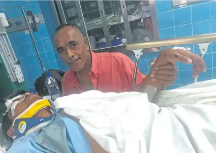  ??  ?? David Saua (left) and his father, Koia Saua, at the Suva Colonial War Memorial Hospital after he was involved in a road accident on July 27, 2018.