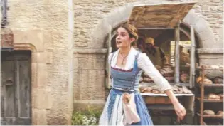  ?? WALT DISNEY PICTURES/TRIBUNE NEWS SERVICE ?? Emma Watson as Belle in a scene from “Beauty and the Beast,” directed by Bill Condon.