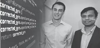  ?? DAN JANISSE ?? University of Windsor engineerin­g student Joshua Jaekel, left, and Prof. Jalal Ahamed worked together on Jaekel’s design for a wearable smart device that uses acoustic waves and sensors to detect objects.