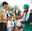  ??  ?? This was the first time the families living in the Tamweel Tower had given ‘Ramadan care bags’ to over 400 workers and they want to do something like this on Eid Al Fitr too.