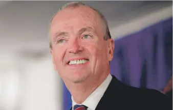  ?? JULIO CORTEZ/ AP ?? New Jersey Gov. Phil Murphy signed a bill allowing licensed casinos and racetracks to offer sports betting in a taxed, regulated setting.