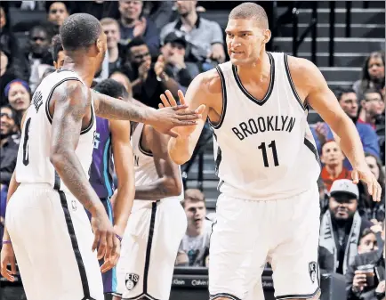  ?? Getty Images ?? TRUST THE PROCESS: Despite having the NBA’s worst record, Brook Lopez (right), Sean Kilpatrick and the Nets are still trying to “get better every day” and trust in what first-year coach Kenny Atkinson is trying to do.