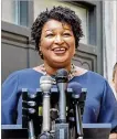  ?? NYT ?? Georgia gubernator­ial candidates Brian Kemp and Stacey Abrams favor different law-and-order policies. Gov. Nathan Deal said he hopes his successor will keep the criminal justice council he formed.