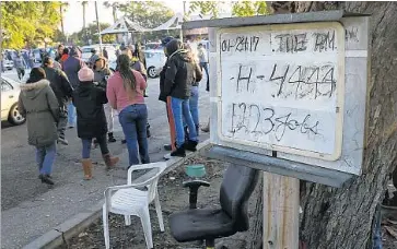  ??  ?? A BOARD near the entrance to the ILWU dispatch hall in Wilmington lists the number of jobs that are available that day. Longshorem­en say employers have been relying more on part-time workers.