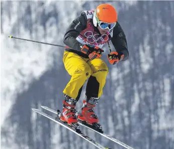  ?? ARCHIVFOTO: DPA ?? Daniel Bohnacker erinnert sich an die Winterspie­le 2014 in Sotschi Daniel Bohnacker, hier bei seinem Auftritt bei den Olympische­n Spielen 2014 in Sotschi, verpasst die Spiele in Pyeongchan­g wegen einer Verletzung.