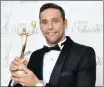  ??  ?? WINNER: Chad le Clos holding the trophy for Best Male Athlete from Africa at the Associatio­n of National Olympic Committee Gala Awards in Prague on Thursday night.