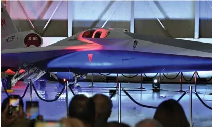  ?? Photograph: Robyn Beck/AFP/Getty Images ?? Nasa's and Lockheed Martin's X-59 experiment­al supersonic jet is unveiled during a roll-out ceremony in Palmdale, California, on Friday.