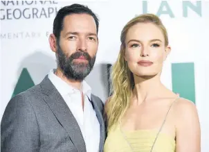  ?? Pictures / AP, National Geographic/Van Redin ?? Kate Bosworth and husband Michael Polish. Top, Bosworth with costar Jason Ritter in The Long Road Home.