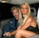  ?? Kerrang awards. Photograph: Shuttersto­ck ?? Whibley with Paris Hilton at the 2003