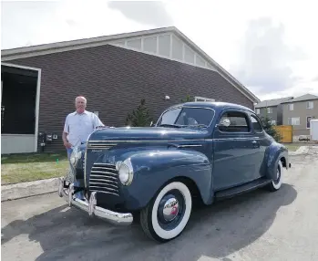  ?? GREG WILLIAMS/DRIVING ?? Arthur Lange, with his 1940 Plymouth club coupe, is a self-taught auto body and paint man.