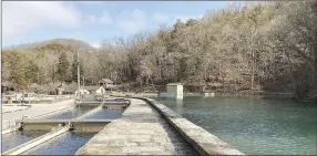  ?? NWA Democrat-Gazette photograph by Flip Putthoff ?? A renovation of the Roaring River trout hatchery, seen here on Feb. 1, is complete. The hatchery supplies rainbow trout for anglers at Roaring River State Park near Cassville, Mo.