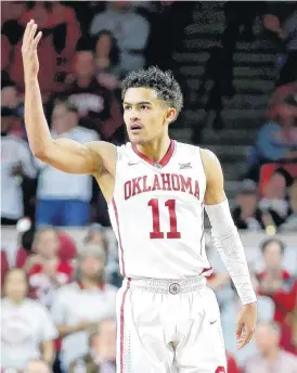  ?? [PHOTO BY BRYAN TERRY, THE OKLAHOMAN] ?? Oklahoma’s Trae Young gestures to the crowd Wednesday after a double technical was called during the game between the Oklahoma Sooners and the Oklahoma State Cowboys at Lloyd Noble Center in Norman. The Sooners won, 109-89.