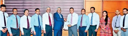  ??  ?? Fairfirst Insurance, DFCC Bank and Reliance Insurance Brokers management during MOU signing