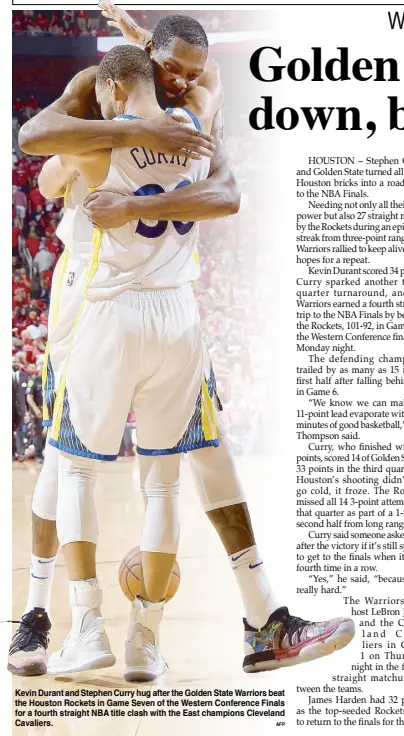  ?? AFP ?? Kevin Durant and Stephen Curry hug after the Golden State Warriors beat the Houston Rockets in Game Seven of the Western Conference Finals for a fourth straight NBA title clash with the East champions Cleveland Cavaliers.