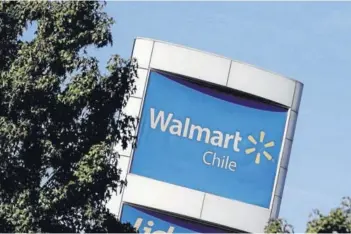  ?? FOTO: ANDRES PEREZ ?? Imagen corporativ­a de Walmart en Chile.