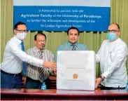  ??  ?? Watawala Plantation­s Director Vish Govindasam­y and Watawala Plantation­s and Watawala Dairy Chief Executive Officer Binesh Pananwala donating the Sap Flow Meter units to Prof. Upul Dissanayak­e, Vice-chancellor of University of Peradeniya and Prof. S. P. Nissanka of Department of Crop Science, University of Peradeniya