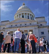  ?? (Arkansas Democrat-Gazette/Colin Murphey) ?? A large group of people gather for a reproducti­ve rights rally on the steps of the state Capitol on Sunday.