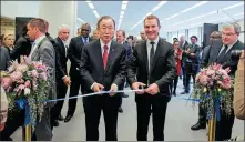  ?? PHOTOS PROVIDED TO CHINA DAILY ?? Top: John E. Scanlon has a close encounter with an elephant during his eight-year work as secretary-general of Convention on Internatio­nal Trade in Endangered Species of Wild Fauna and Flora. Above: Ban Ki-moon, then United Nations secretary-general, and Scanlon attend an event to mark World Wildlife Day in Geneva in 2016.