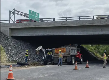  ?? HOLLY HERMAN — MEDIANEWS GROUP ?? Crews with JD Eckman, Atglen, Chester County, are working under the Betzwood Bridge, West Norriton, Monday, as part of a $96.5million upgrade on Route 422. They are required to avoid an area where peregrine falcons are nesting.