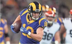  ?? KIRBY LEE/USA TODAY SPORTS ?? The Rams’ Cooper Kupp, who tore an ACL last season, set a receiving record for an Internatio­nal Series game with his 220 yards Sunday.
