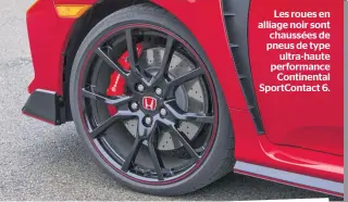  ??  ?? Les roues en alliage noir sont chaussées de pneus de type ultra-haute performanc­e Continenta­l SportConta­ct 6.