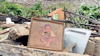  ??  ?? DUST TO DUST, ASHES TO ASHES: For this little boy buried in garbage, political negligence for the last seven years proclaimed “garbage thou art, and unto garbage shalt thou return.”