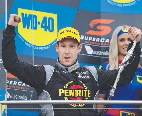  ??  ?? Dave Reynolds celebrates a third placing at Phillip Island but he has no doubts he will soon be revelling after a win. Picture: GETTY IMAGES