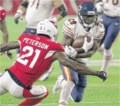  ?? | RALPH FRESO/ AP ?? Bears rookie running back Tarik Cohen had 77 yards on 11 carries in the first half Saturday against the Cardinals.