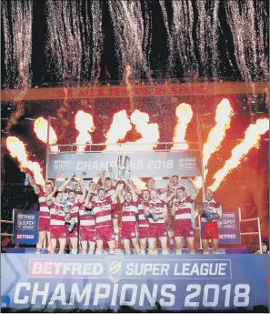  ??  ?? WINNING FEELING: Just a month after Wigan Warriors were crowned Super League champions, the countdown to the 2019 season has begun. PICTURE: SWPIX.COM