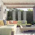  ??  ?? Botanical and Moroccan-style screens are both decorative and great for dividing garden space into ‘rooms’