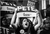  ?? ASSOCIATED PRESS ?? ATTENDEES CHEER AS DEMOCRATIC PRESIDENTI­AL candidate former South Bend, Ind., Mayor Pete Buttigieg speaks during a campaign event at Northwest Junior High on Sunday in Coralville, Iowa.