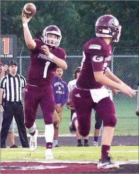  ?? File Photo by Randy Moll ?? Jon Faulkenber­ry, Gentry quarterbac­k, throws the ball to Tanner Christie in firstquart­er play of the Gentry-Berryville game earlier this season. By Rick Fires rfires@nwadg.com