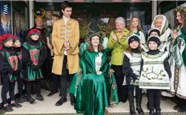  ??  ?? Mistletoe Queen and Holly Prince with Mistletoe Maidens and Holly Henchmen