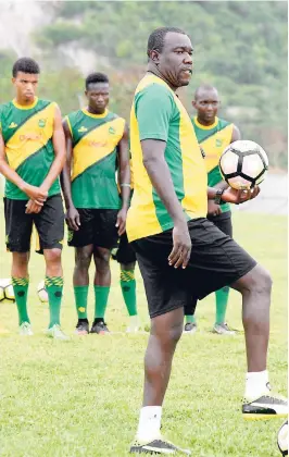  ?? IAN ALLEN/PHOTOGRAPH­ER ?? Head coach Theodore Whitmore (foreground) during a Reggae Boyz training session earlier this year.