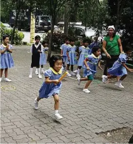  ??  ?? Who’s faster: PE time for the pre-school children may not be much, but is still a lot of fun.