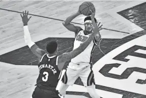  ?? JUSTIN FORD/USA TODAY SPORTS ?? Mississipp­i uard Devontae Shuler, top, controls the ball against Mississipp­i State guard D.J. Stewart Jr. during the first half Tuesday at Humphrey Coliseum in Starksvill­e, Miss.