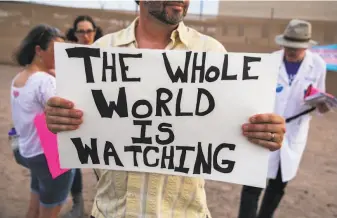  ?? Ilana Panich-Linsman / New York Times ?? Protesters rally Tuesday outside the Border Patrol station in Clint, Texas. Reports on the facility have described troubling conditions for migrant children being held at the site.