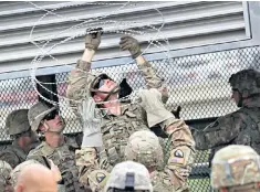  ??  ?? Soldiers bolster the Texas border with Mexico at Hidalgo, as ordered by the president