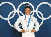  ?? NATACHA PISARENKO/AP 2021 ?? U.S. Olympian Simone Biles was announced as one of 17 people who will receive the Presidenti­al Medal of Freedom next week at the White House.