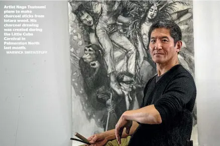  ?? WARWICK SMITH/STUFF ?? Artist Naga Tsutsumi plans to make charcoal sticks from totara wood. His charcoal drawing was created during the Little Cuba Carnival in Palmerston North last month.
